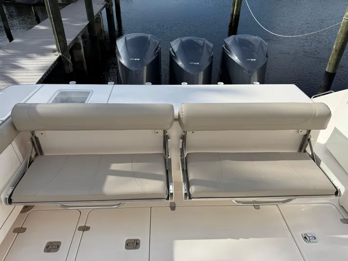  Yacht Photos Pics 2015 Pursuit OS 385 Offshore boat with foldable seats and triple outboard engines.