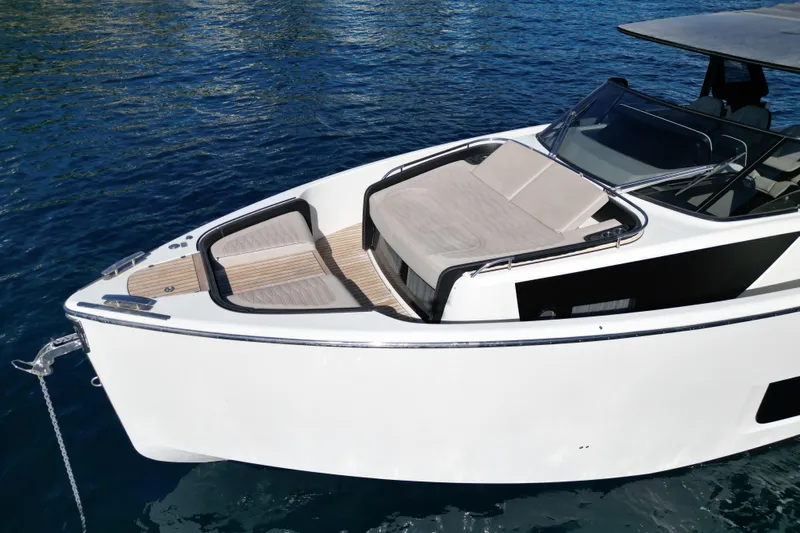  Yacht Photos Pics 2022 Cranchi A46 Luxury Tender on water, showcasing sleek design and spacious deck.