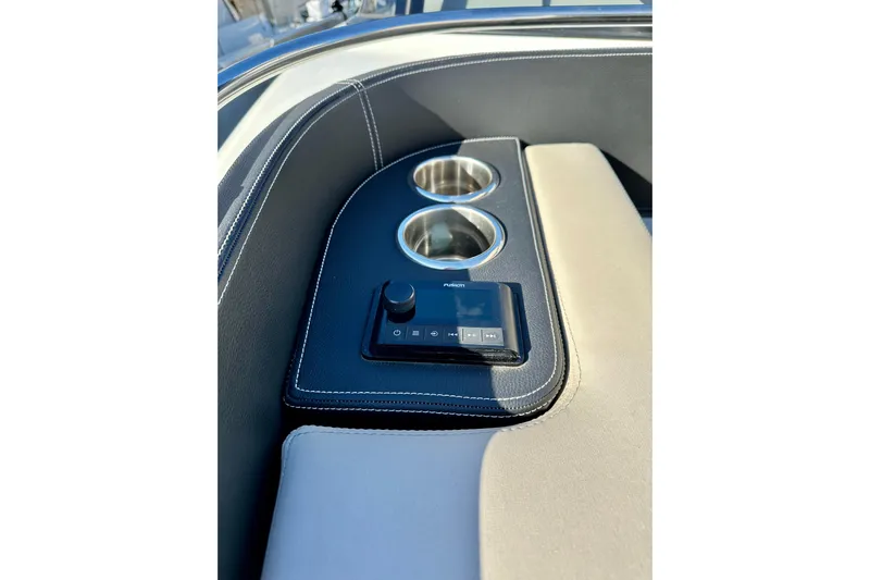  Yacht Photos Pics Interior of 2022 Cranchi A46 Luxury Tender with cup holders and control panel.