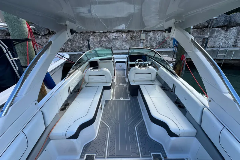  Yacht Photos Pics 2024 Regal LX9 boat interior with sleek white seating and modern design.