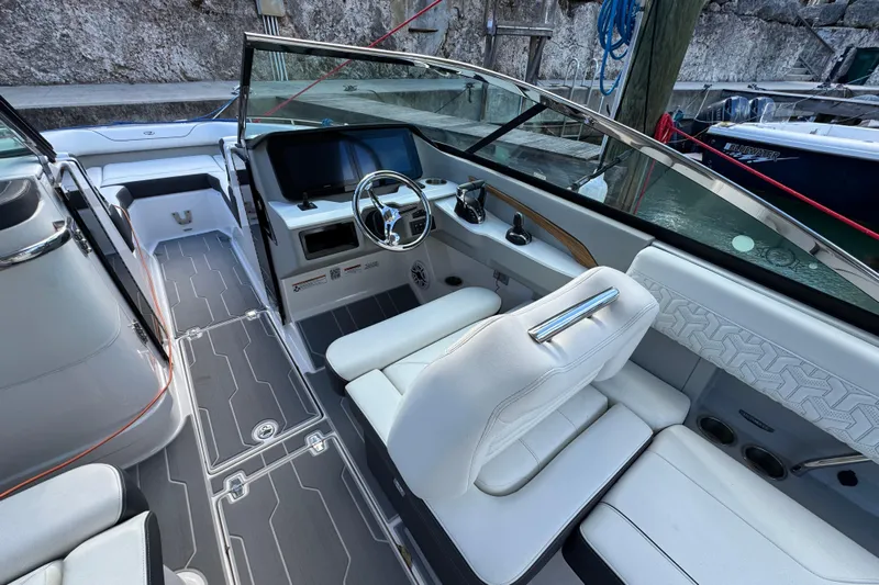  Yacht Photos Pics 2024 Regal LX9 boat interior with modern dashboard and luxurious seating.