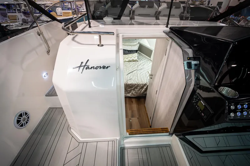  Yacht Photos Pics Interior view of 2026 Hanover 347 boat, featuring cabin entrance and sleek design.