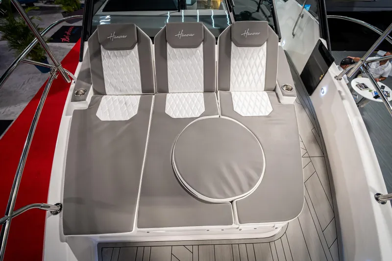  Yacht Photos Pics 2026 Hanover 347 boat interior with luxurious gray and white seating.