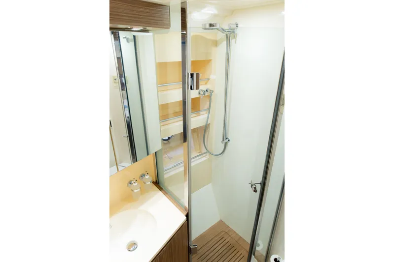  Yacht Photos Pics Luxurious bathroom in 2013 Azimut Atlantis 48 yacht with modern shower and sleek design.