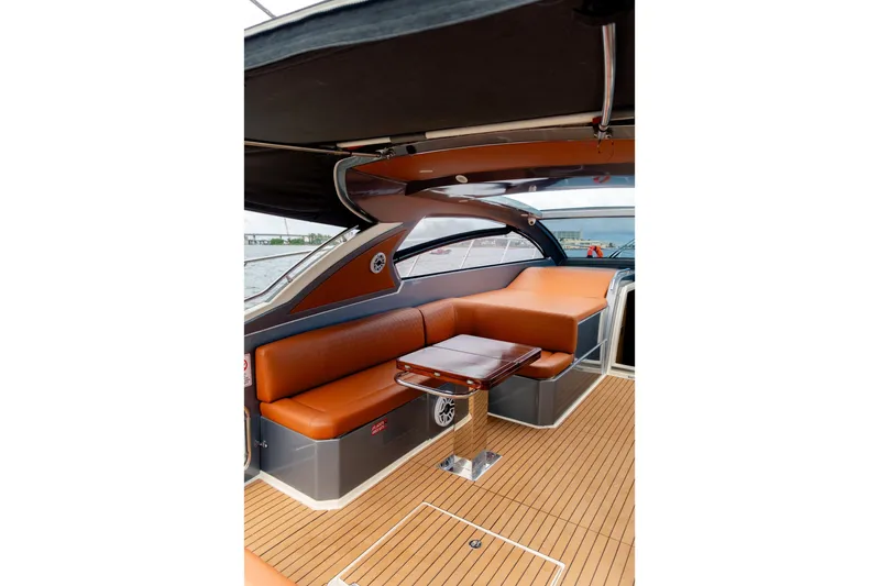  Yacht Photos Pics Luxurious interior of 2013 Azimut Atlantis 48 yacht with elegant seating and wooden flooring.