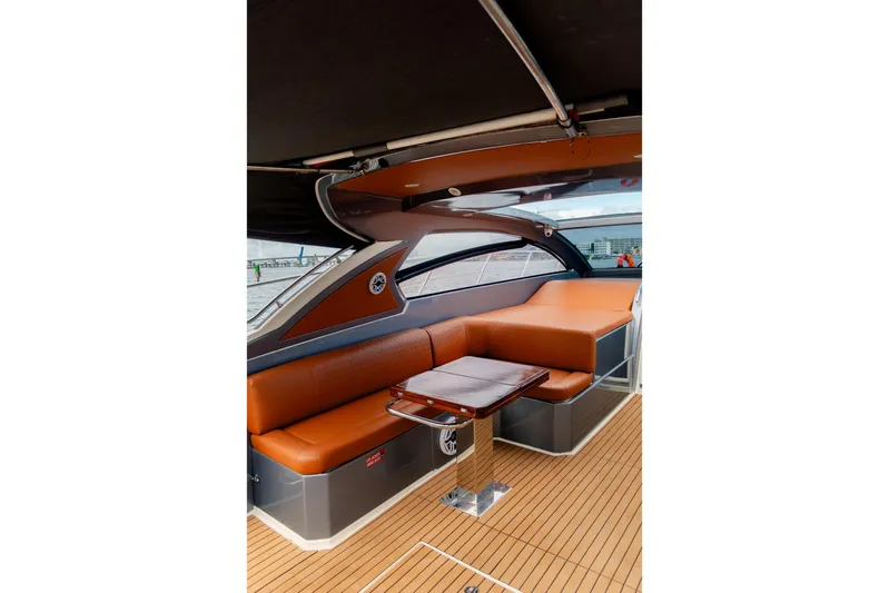  Yacht Photos Pics Luxurious interior of 2013 Azimut Atlantis 48 yacht with elegant seating and wooden table.