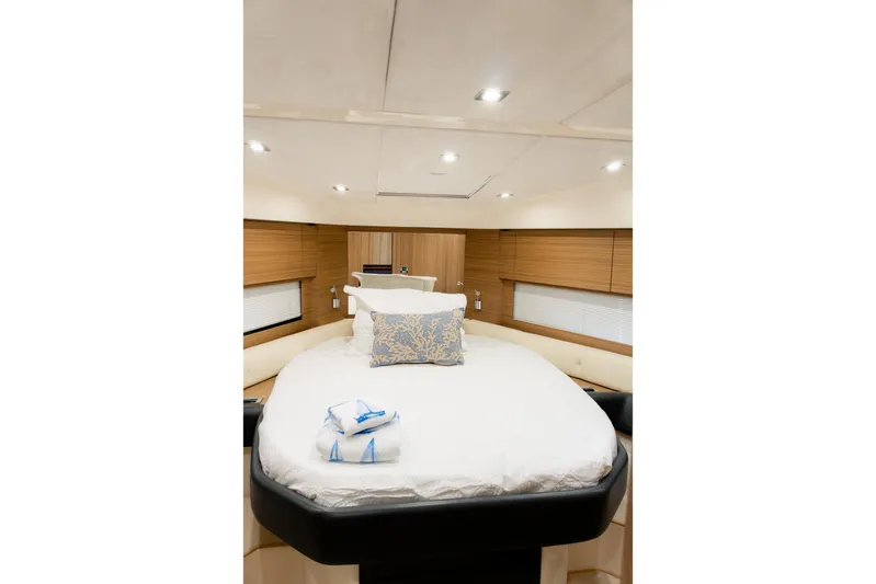  Yacht Photos Pics Luxurious cabin interior of 2013 Azimut Atlantis 48 yacht with elegant bedding.