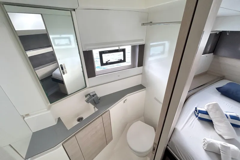  Yacht Photos Pics Modern bathroom and bedroom interior on a 2020 Leopard 50 yacht.