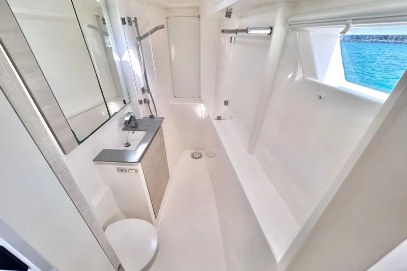  Yacht Photos Pics Modern bathroom interior on 2020 Leopard 50 yacht, featuring sleek design and ocean view.