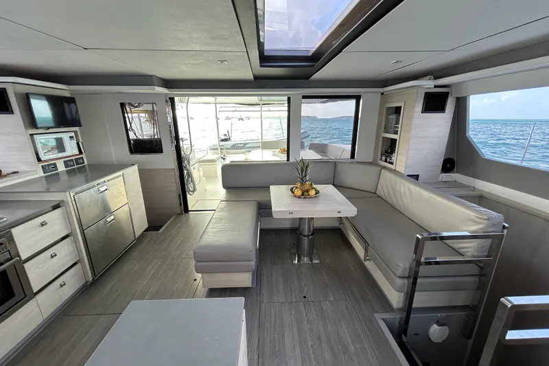  Yacht Photos Pics Luxurious interior of 2020 Leopard 50 yacht with modern kitchen and ocean view.