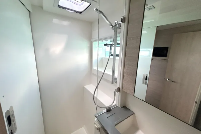  Yacht Photos Pics Modern bathroom interior in 2020 Leopard 50 yacht, featuring sleek shower and mirror.