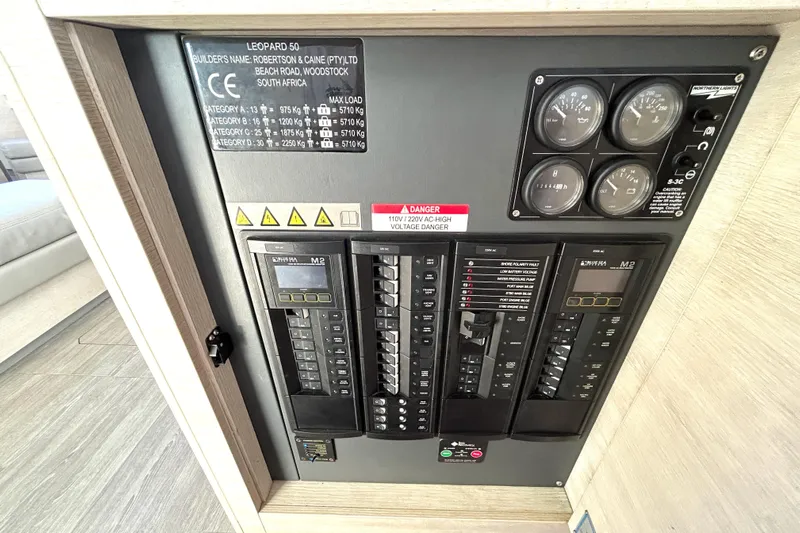  Yacht Photos Pics Electrical control panel of a 2020 Leopard 50 yacht, featuring gauges and switches.