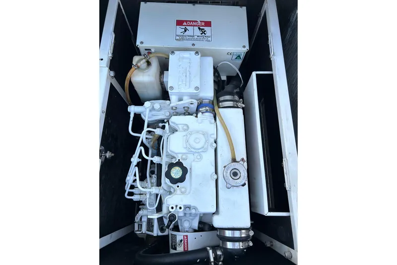  Yacht Photos Pics Engine compartment of a 2020 Leopard 50 model, showcasing mechanical components.