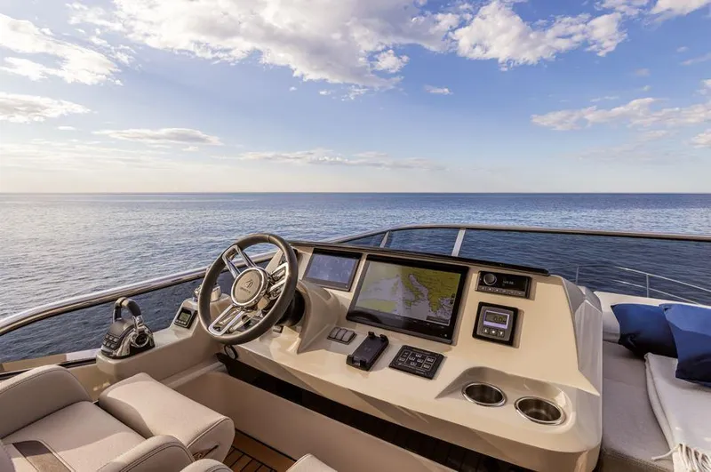 Absolute 60 Fly Yacht Photos Pics Helm of 2025 Absolute 60 Fly yacht with ocean view and navigation screens.