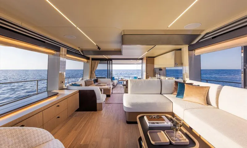 Absolute 60 Fly Yacht Photos Pics Luxurious interior of 2025 Absolute 60 Fly yacht with ocean view and elegant furnishings.
