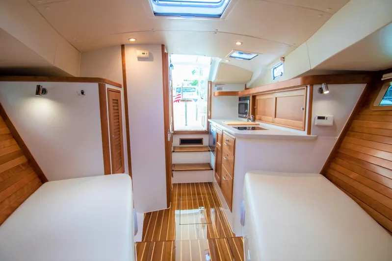 Sandora Yacht Photos Pics Interior of 2023 MJM 35 yacht with wooden accents and modern amenities.