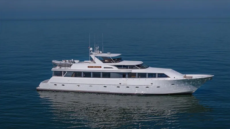 Think B.i.g Yacht Photos Pics Luxury yacht Westport 106 Raised Pilothouse, 1995 model, cruising on calm blue waters.