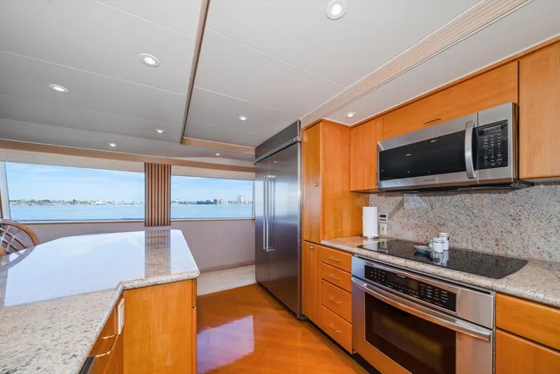Think B.i.g Yacht Photos Pics Luxurious kitchen in 1995 Westport 106 Raised Pilothouse yacht with modern appliances and ocean view.