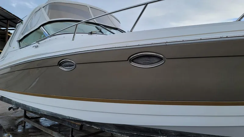  Yacht Photos Pics 2004 Formula 330 SS boat with sleek design and white exterior.