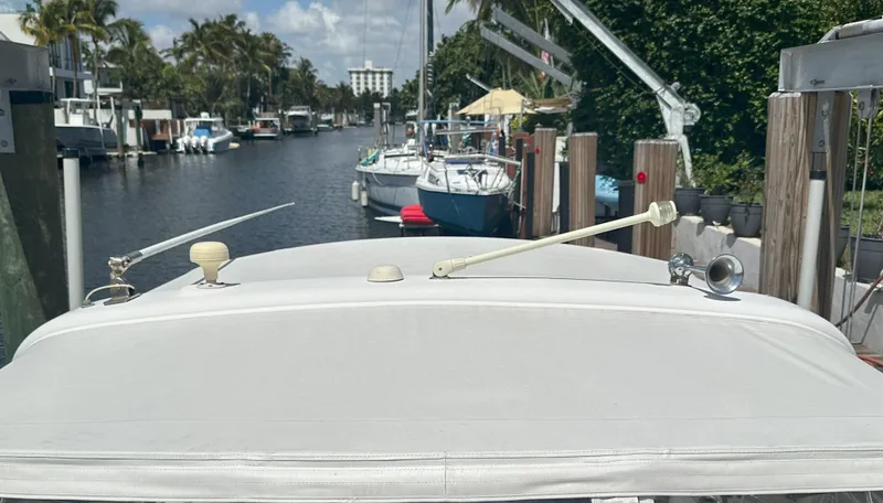  Yacht Photos Pics 2004 Formula 330 SS boat docked in a sunny marina.