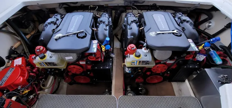  Yacht Photos Pics 2004 Formula 330 SS engine compartment with dual engines and clean layout.