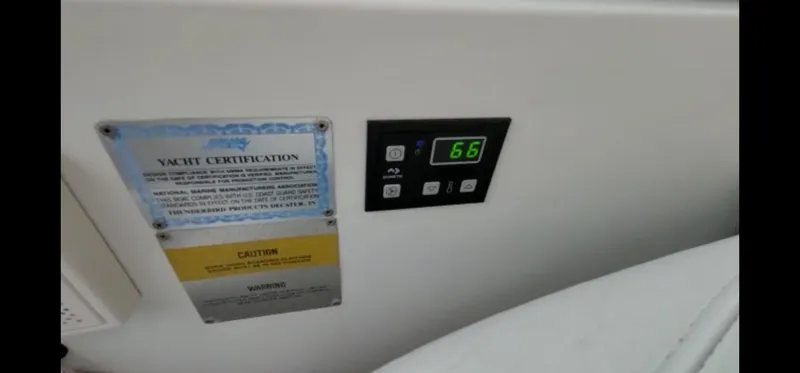  Yacht Photos Pics Control panel and certification on a 2004 Formula 330 SS yacht.