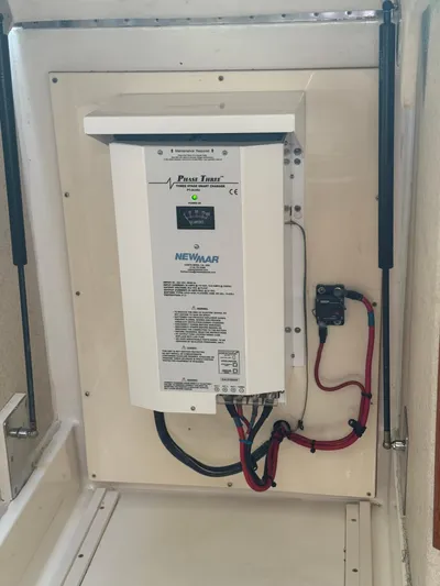 Cayuco Yacht Photos Pics Electrical panel in a 2010 Cabo 40 Express boat, featuring Newmar components.