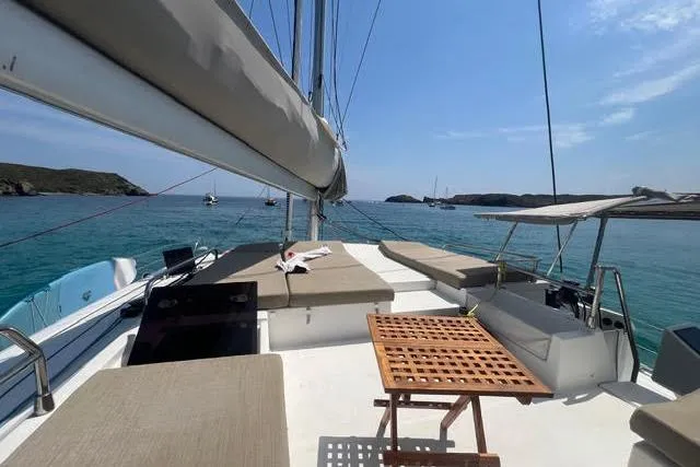 Sanouva Yacht Photos Pics 2019 Fountaine Pajot SABA 50 catamaran with spacious deck and scenic ocean view.