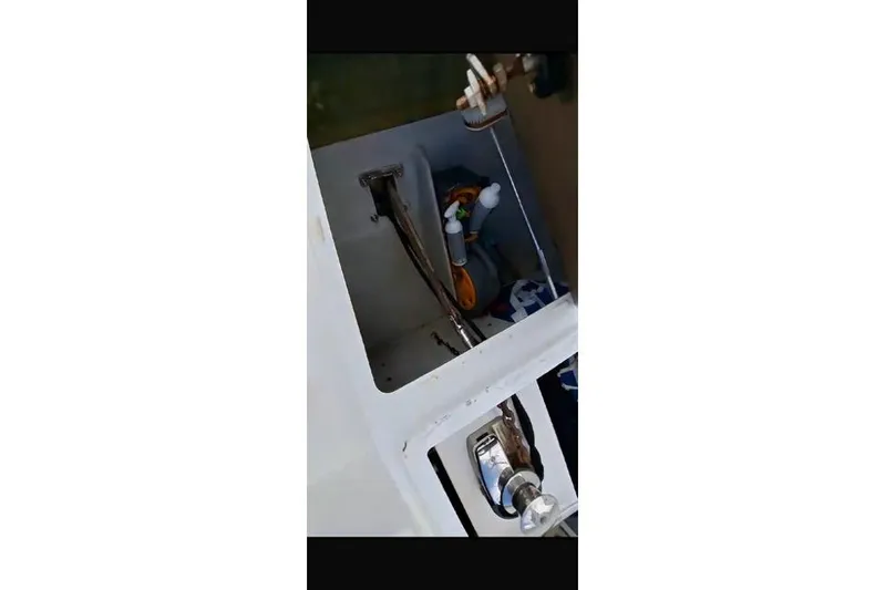 Sanouva Yacht Photos Pics Interior compartment of 2019 Fountaine Pajot SABA 50 yacht, showing storage and equipment.