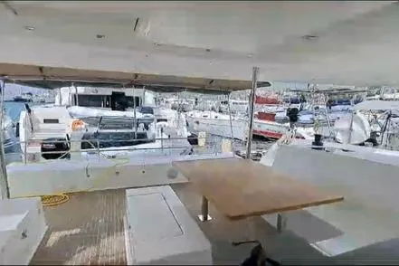 Sanouva Yacht Photos Pics 2019 Fountaine Pajot SABA 50 catamaran interior with marina view.