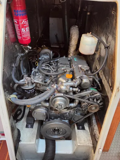  Yacht Photos Pics Engine compartment of a 2000 Catalina 42 MkII sailboat with visible fire extinguisher.