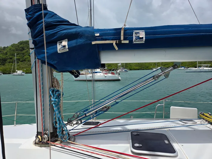  Yacht Photos Pics Sailboat deck view of a 2000 Catalina 42 MkII with rigging and blue sail cover.