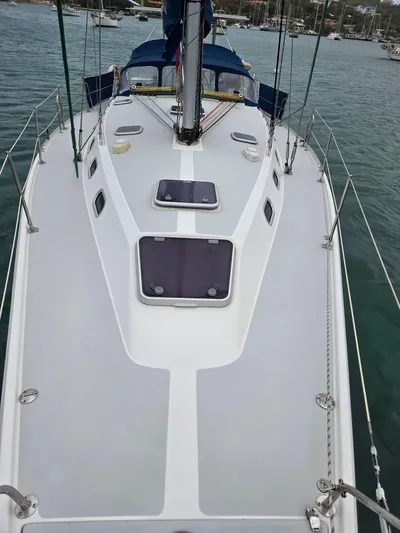  Yacht Photos Pics Catalina 42 MkII sailboat deck, 2000 model, anchored in calm waters.