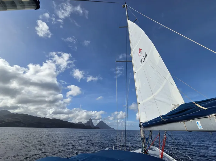  Yacht Photos Pics Sailing on a 2000 Catalina 42 MkII with scenic ocean and mountain views.