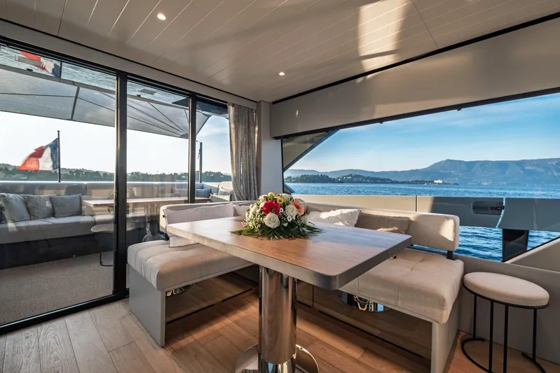 M8-15 Yacht Photos Pics Luxurious interior of 2023 Bluegame BGX 63 yacht with scenic ocean view.