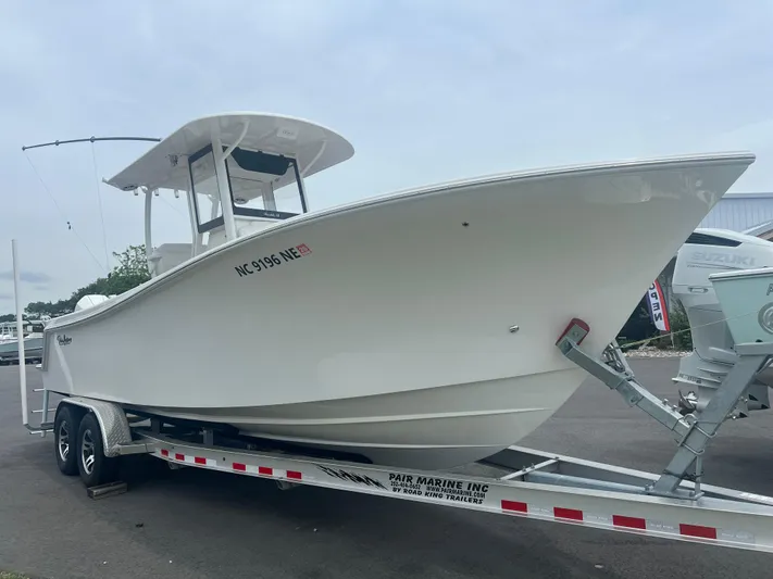  Yacht Photos Pics 2025 Pair Customs 28 Center Console boat on trailer, side view.