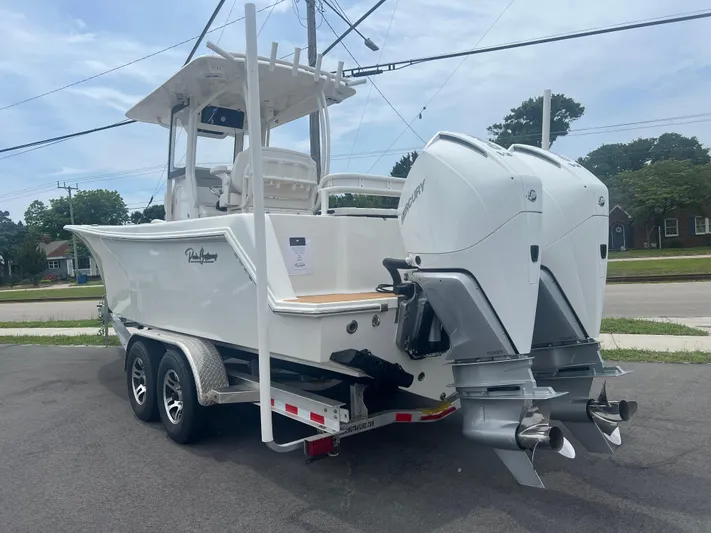  Yacht Photos Pics 2025 Pair Customs 28 Center Console boat with dual engines on a trailer.
