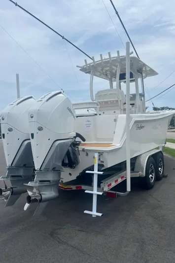  Yacht Photos Pics 2025 Pair Customs 28 Center Console boat with dual outboard motors on a trailer.