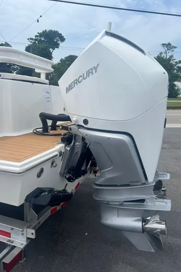  Yacht Photos Pics 2025 Pair Customs 28 Center Console with Mercury outboard engine, parked on a trailer.