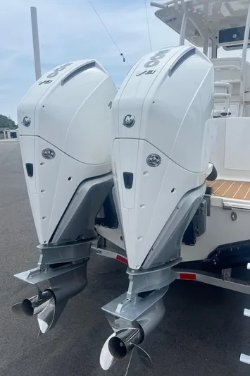  Yacht Photos Pics 2025 Pair Customs 28 Center Console with dual outboard engines, rear view.