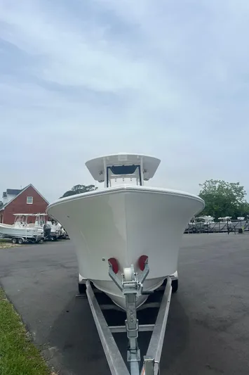  Yacht Photos Pics 2025 Pair Customs 28 Center Console boat on trailer, parked outdoors.