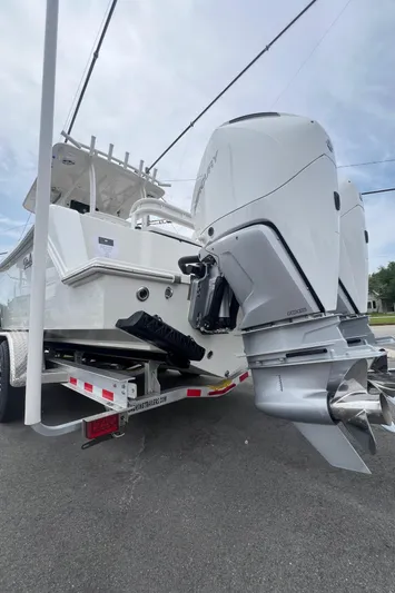  Yacht Photos Pics 2025 Pair Customs 28 Center Console boat on trailer, featuring powerful outboard engines.