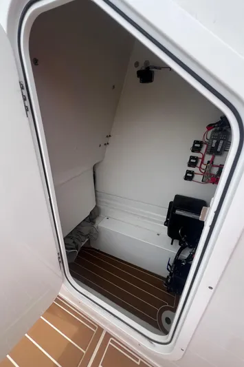  Yacht Photos Pics 2025 Pair Customs 28 Center Console interior with modern equipment and wooden flooring.