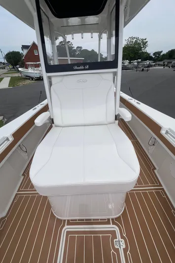  Yacht Photos Pics 2025 Pair Customs 28 Center Console boat with white seating and brown deck.