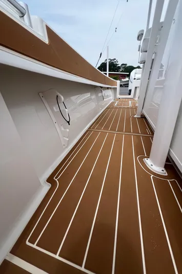  Yacht Photos Pics 2025 Pair Customs 28 Center Console boat with sleek brown and white deck design.