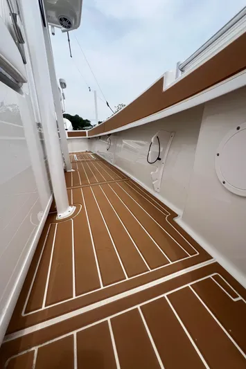  Yacht Photos Pics 2025 Pair Customs 28 Center Console boat with sleek brown and white deck design.