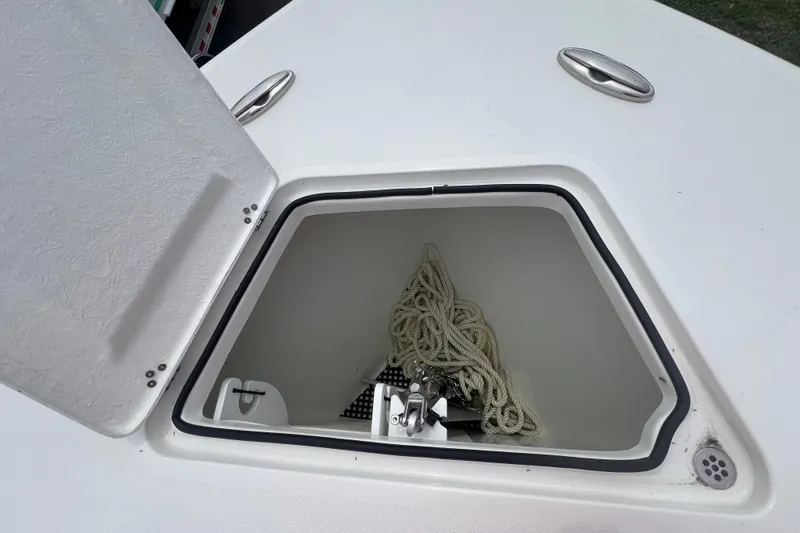  Yacht Photos Pics Open storage compartment on 2025 Pair Customs 28 Center Console boat with rope inside.