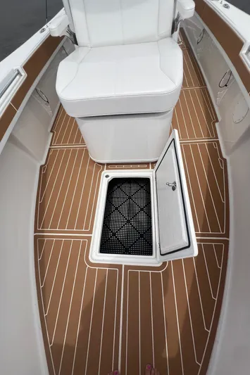  Yacht Photos Pics 2025 Pair Customs 28 Center Console boat interior with open storage compartment.