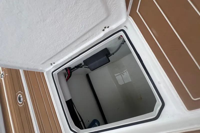  Yacht Photos Pics Open storage compartment on 2025 Pair Customs 28 Center Console boat.