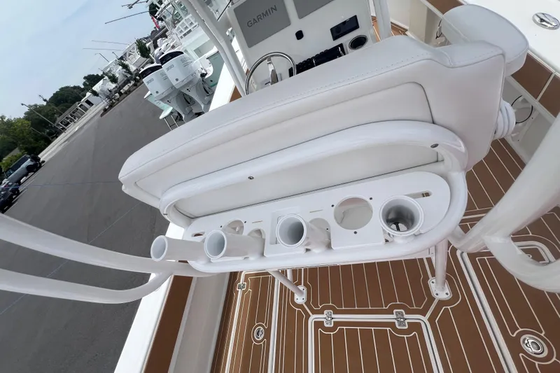  Yacht Photos Pics 2025 Pair Customs 28 Center Console boat interior with rod holders and seating.